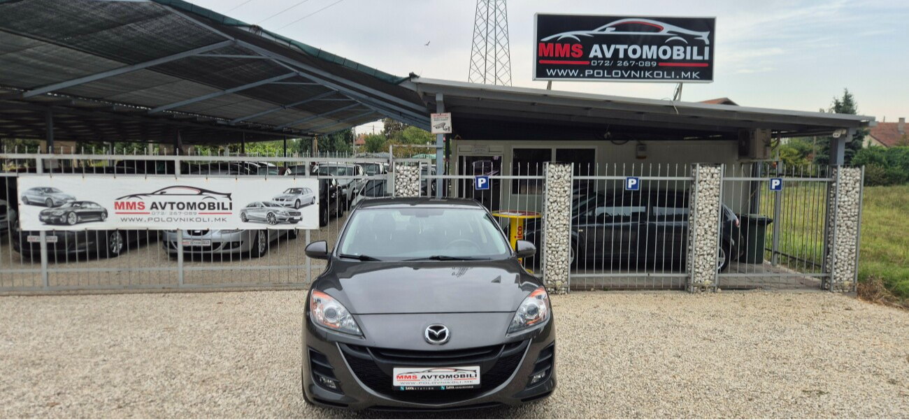 Mazda 323   - 2010