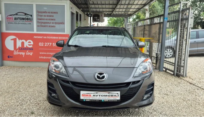 Mazda 323  - 2010